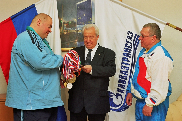Andrei Chemerkin, his coach and Transgas Director General Zinoviev V.V.